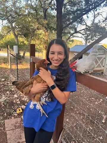 Elle Perry with her chickens